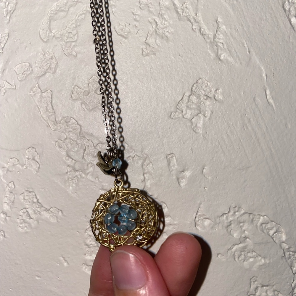 Blue egg birds nest necklace